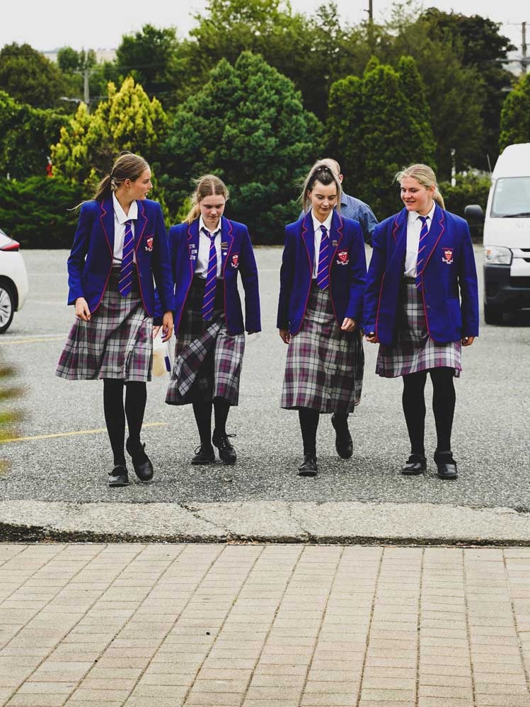 Four_Female_Student_Walking