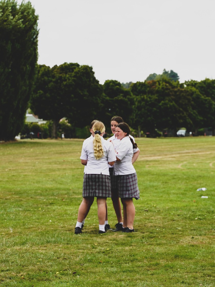 Four_Girls_Playing_On_Field