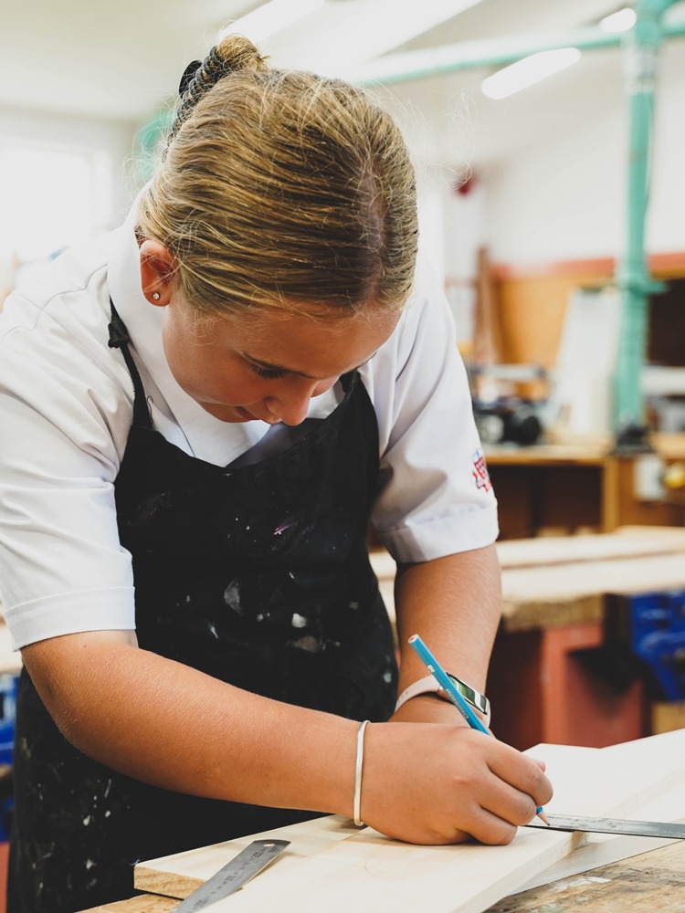 Girl_In_Woodworking_Class